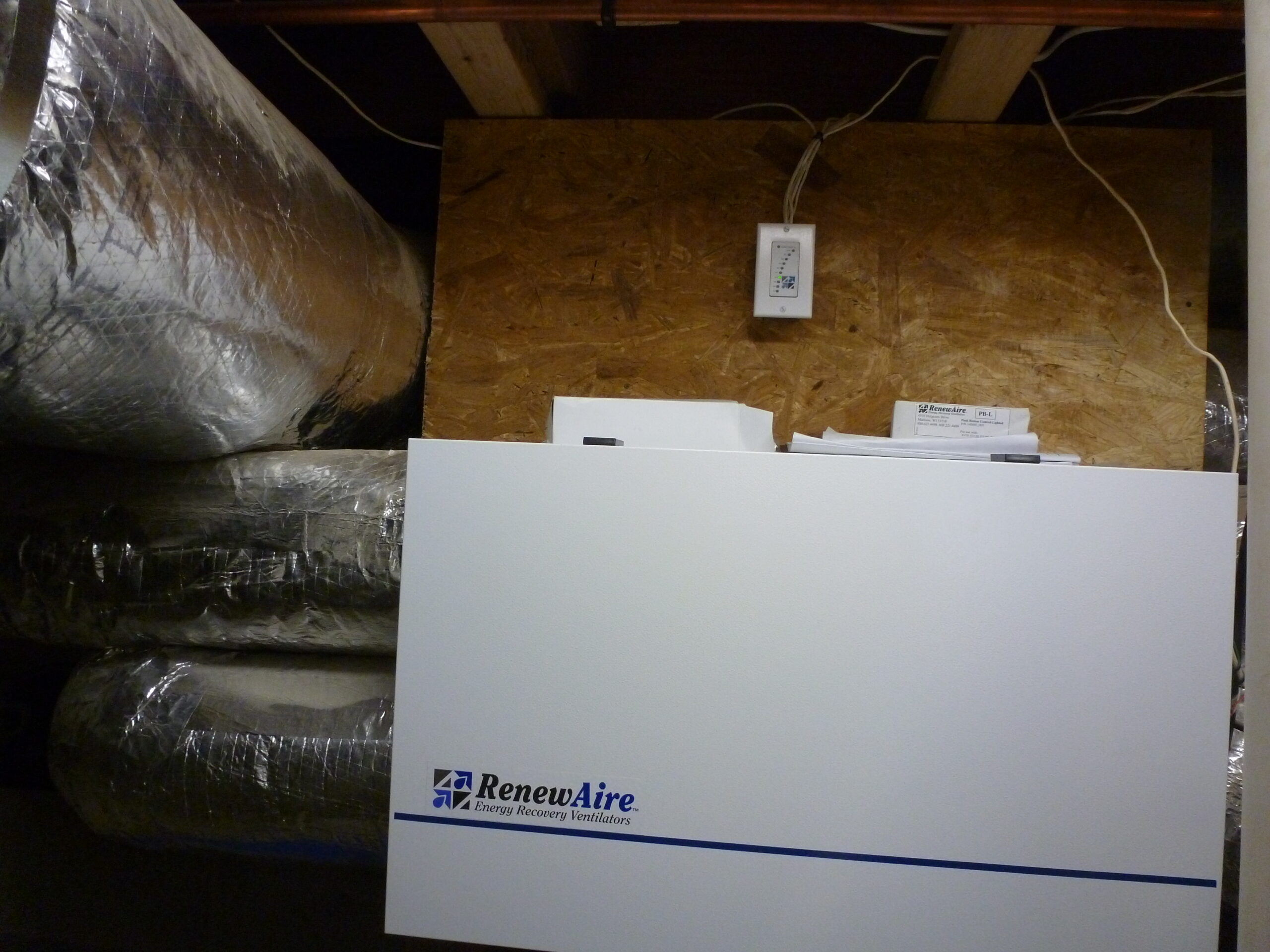 Installation of RenewAire EV200 energy recovery ventilator (ERV)